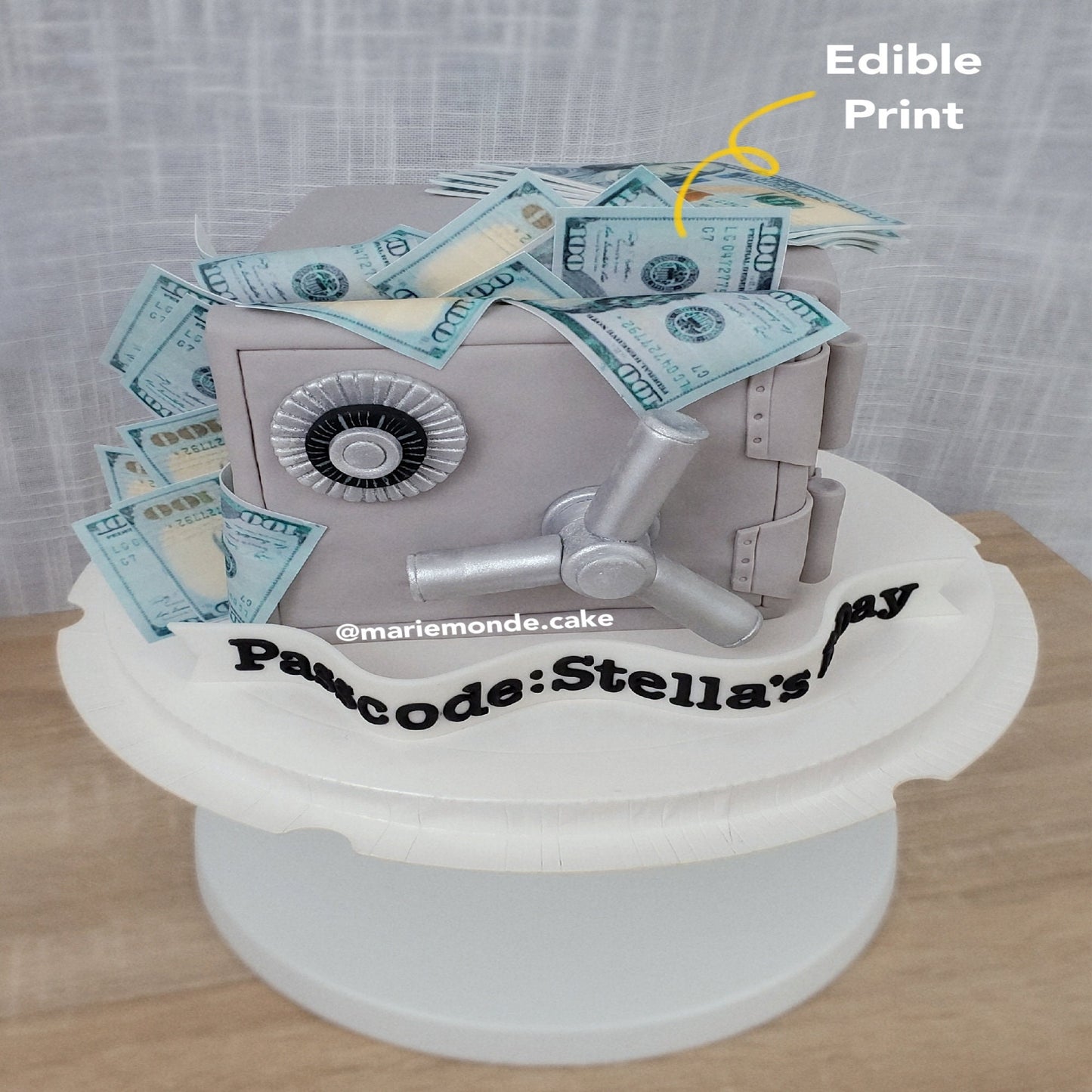 Betters Shop cake safe with edible dollar print spilling out on white stand showcasing Canon edible ink bundle