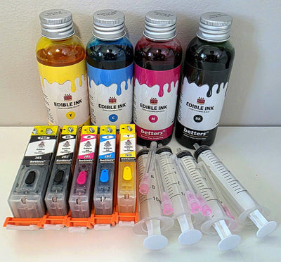 A set of four edible ink refill bottles in different colors, accompanied by five refillable ink cartridges labeled for a Canon printer, with syringes for refilling purposes.